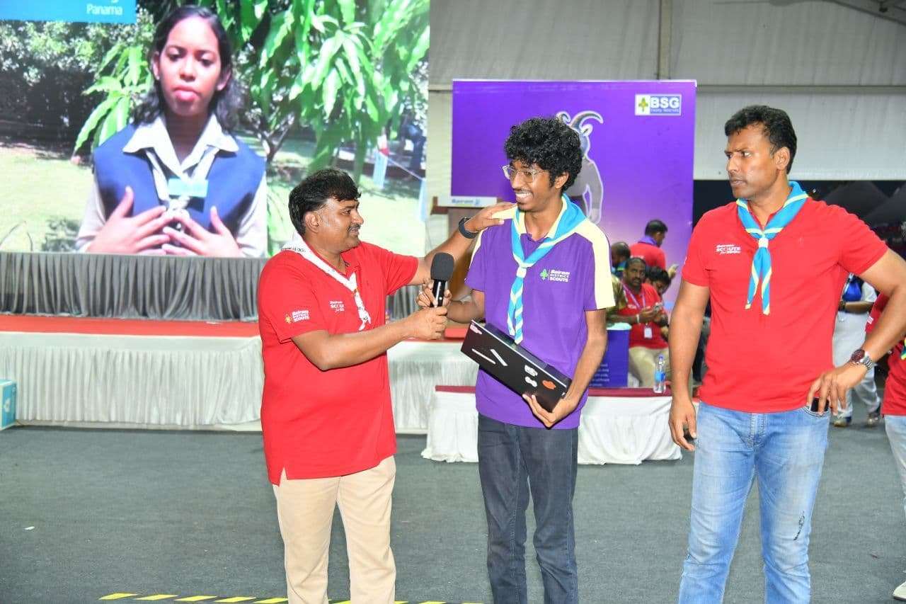 Me getting interviewed on stage about the QR system, laptop still under my arm